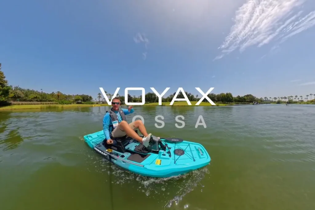 VoyaX MOSSA 97 Review: Smart Pedal Assist, GPS SpotHold, and 360° Steering 7 VoyaX MOSSA electric pedal-assist fishing kayak underway on the water