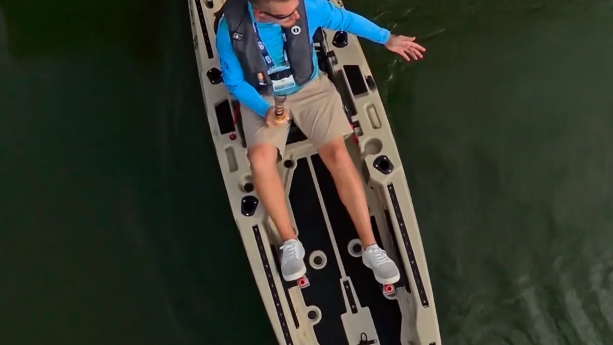 Aerial drone view of an angler in a FluxJet electric kayak