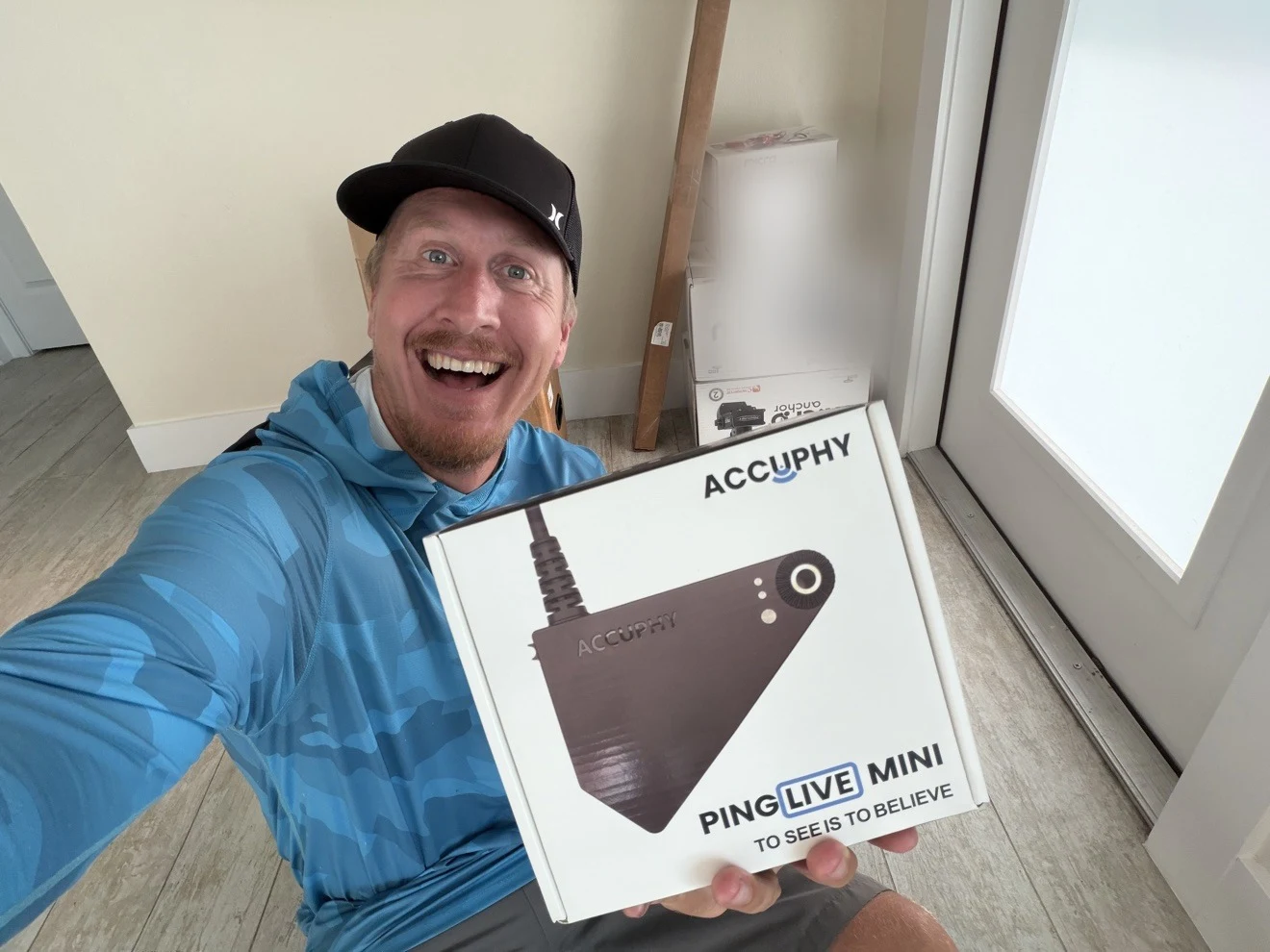 Accuphy Ping Live Mini Review: Live Sonar for $699 3 Justin from KayakDIY holding the Accuphy Ping Live Mini box