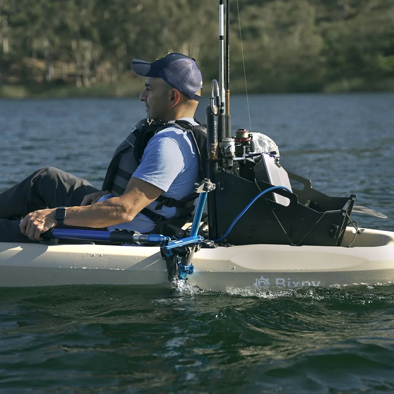 Kayak running a Bixpy motor mounted on the Rod Holder Adapter